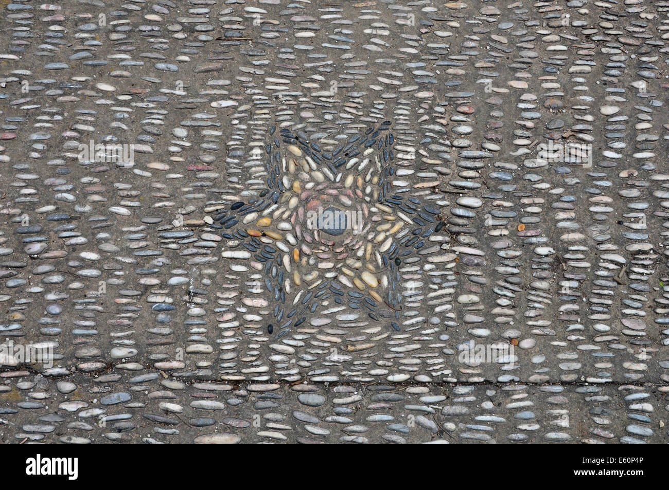 Mosaico de guijarros con estrella resumen antecedentes. Foto de stock