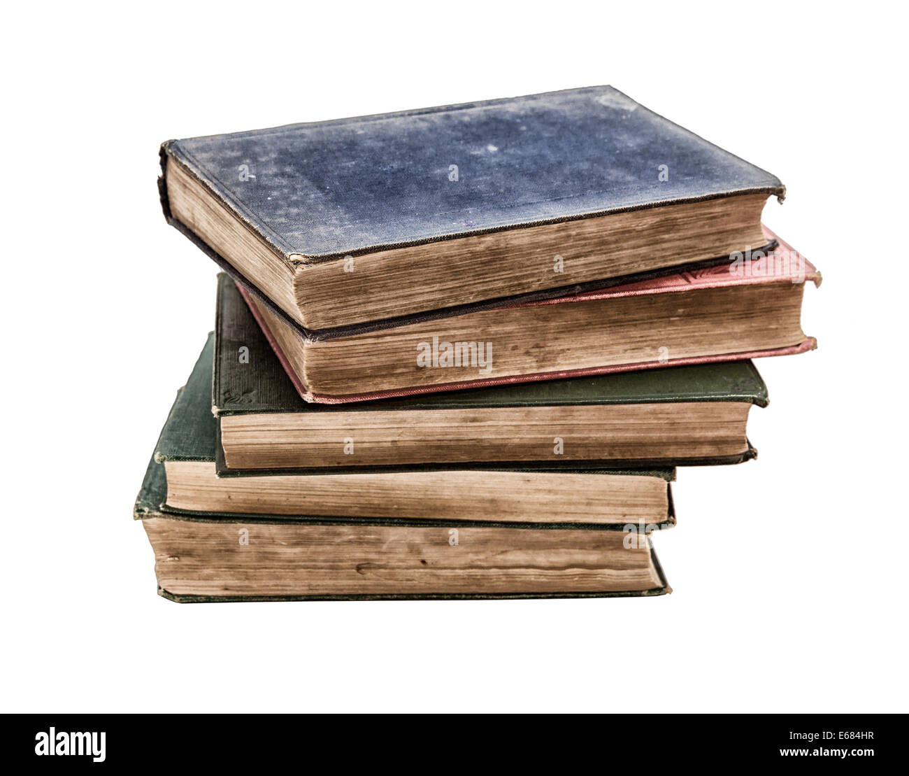 Montón de libros muy antiguos aislado sobre fondo blanco, los libros son de alrededor de 100 años! Foto de stock