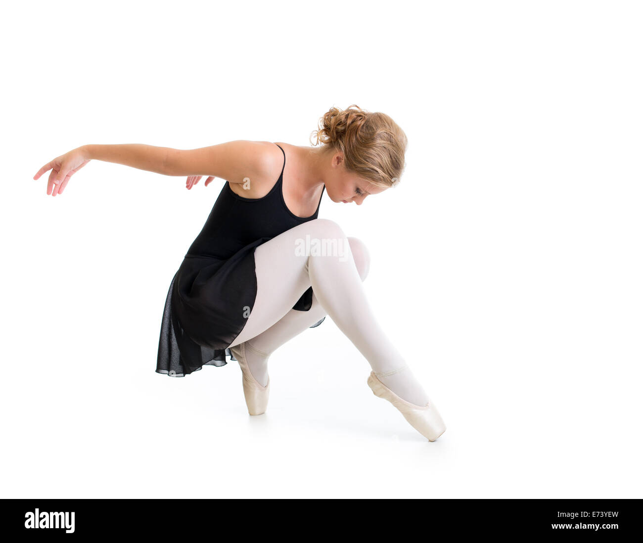 Joven bailarín posando aislado en blanco Foto de stock