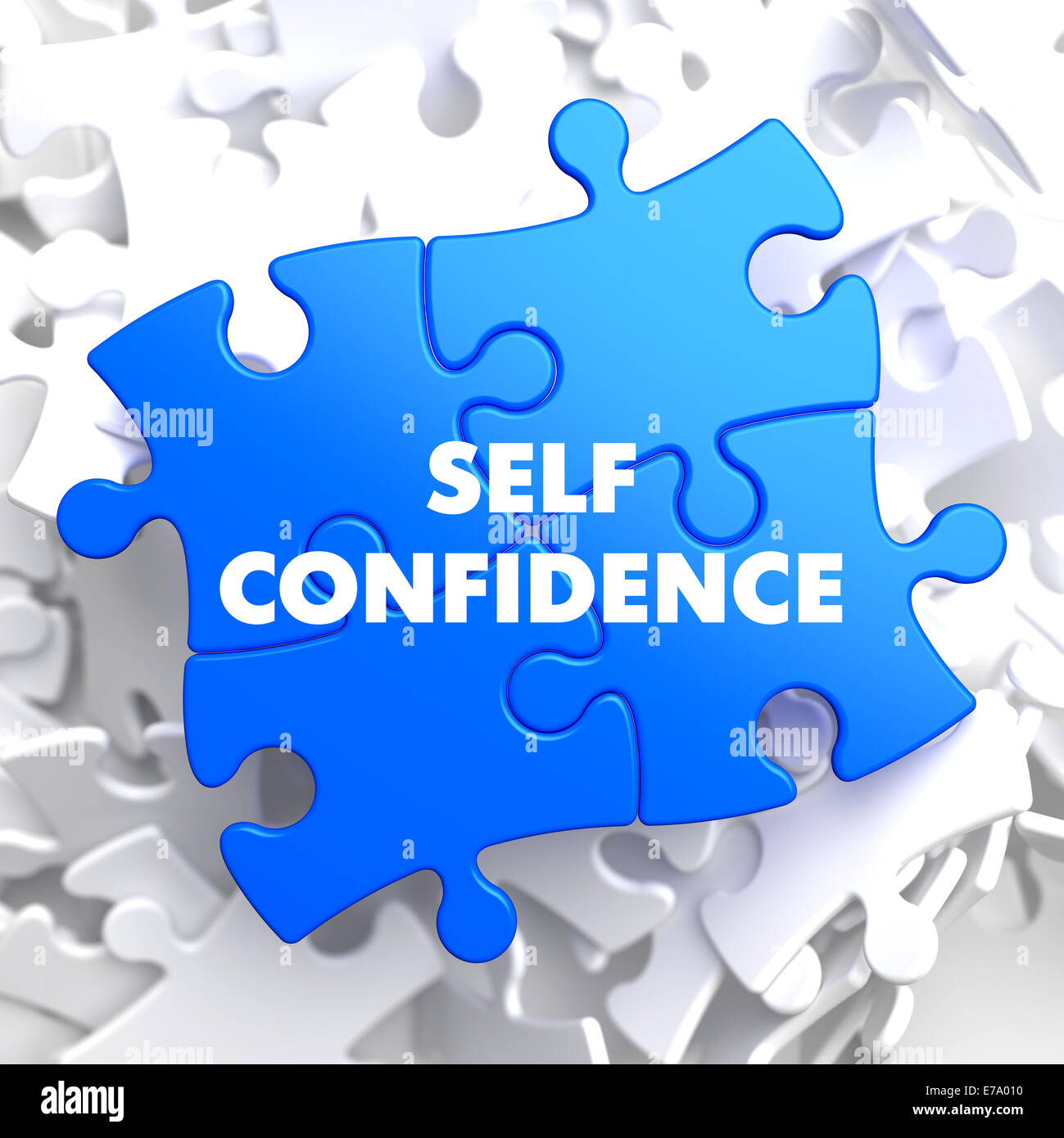 La auto-confianza sobre azul Puzzle. Foto de stock