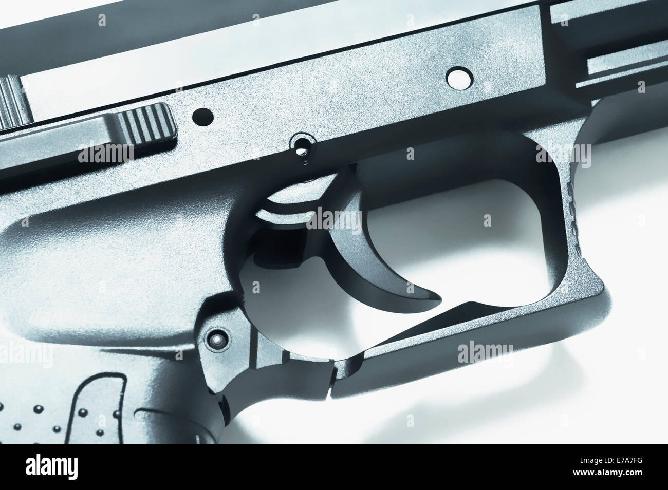 Close-up de el gatillo de una pistola Foto de stock