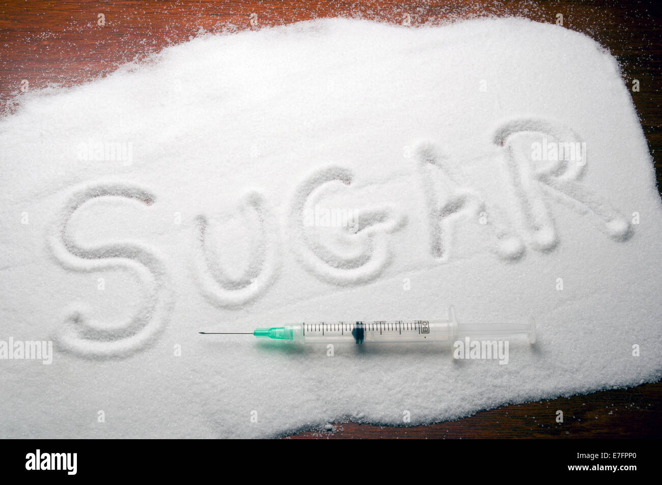 Azúcar escrito en el azúcar. Foto de stock
