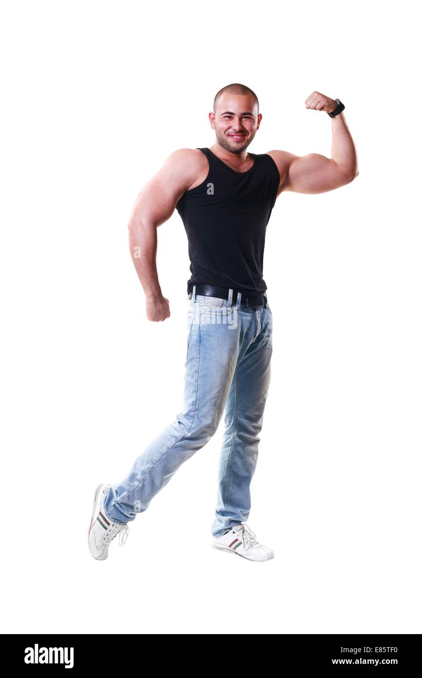 Hombre fuerte mostrando sus músculos con fondo blanco Fotografía de stock -  Alamy