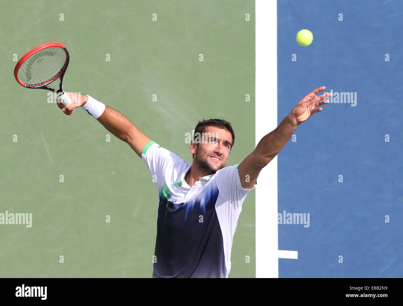 Marin Cilic (CRO) en acción en el US Open 2014 campeonatos en Nueva York, Marin Foto de stock
