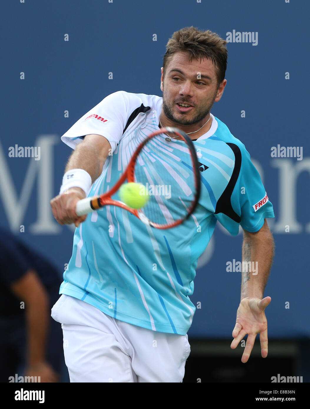 Stan Wawrinka (SUI) en acción en el US Open 2014 campeonatos en Nueva York,Estados Unidos. Foto de stock