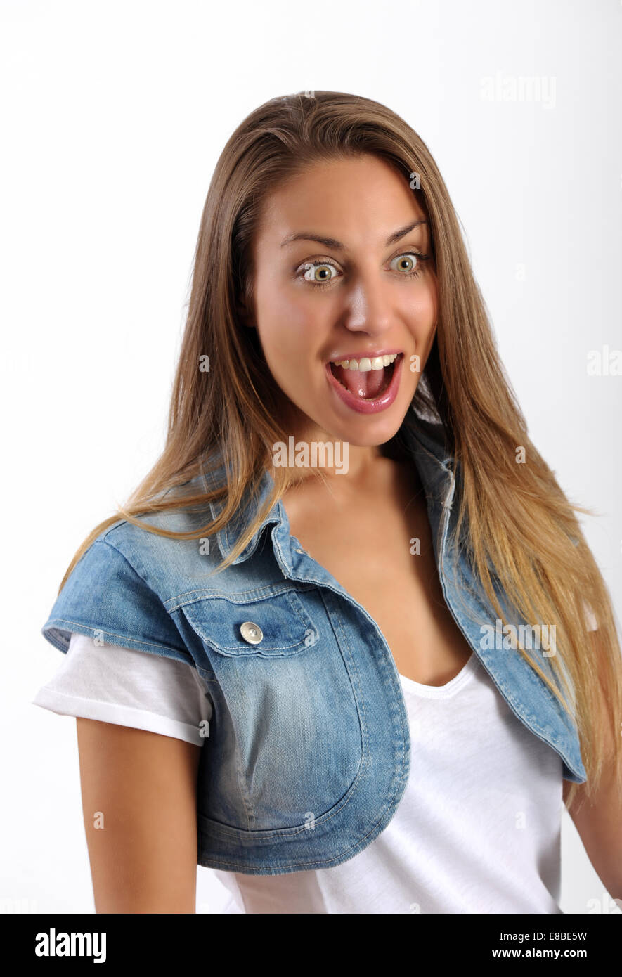 Mujer joven con una mirada de asombro emocionado Foto de stock