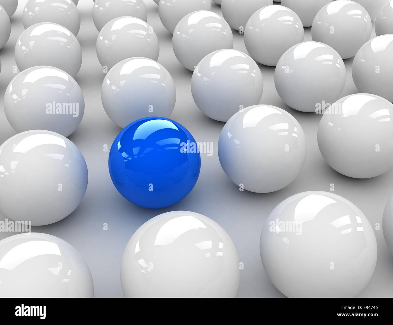 Una esfera azul observably colocado en un grupo de esferas blancas  Fotografía de stock - Alamy