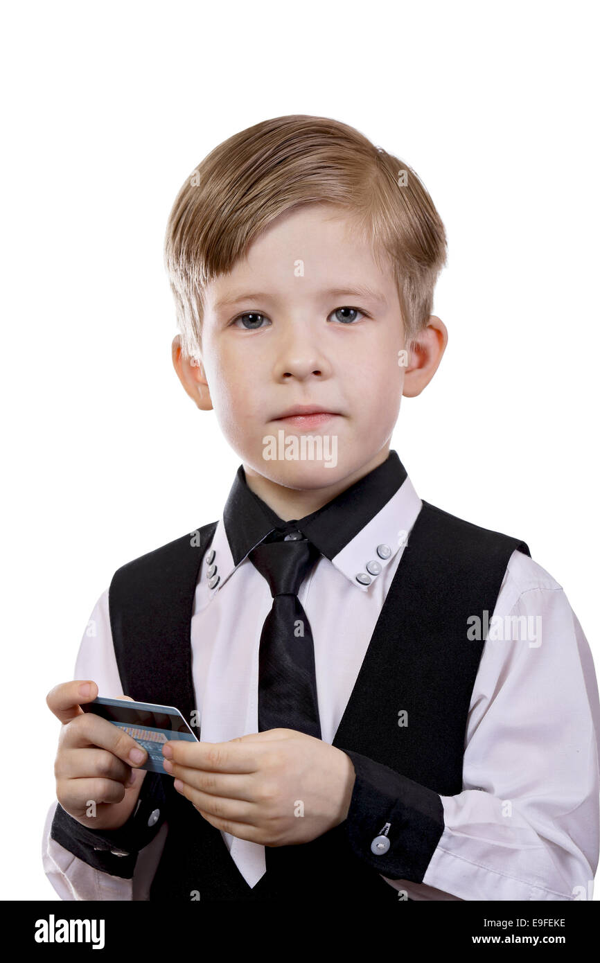 Niño con una tarjeta de pago electrónico Foto de stock