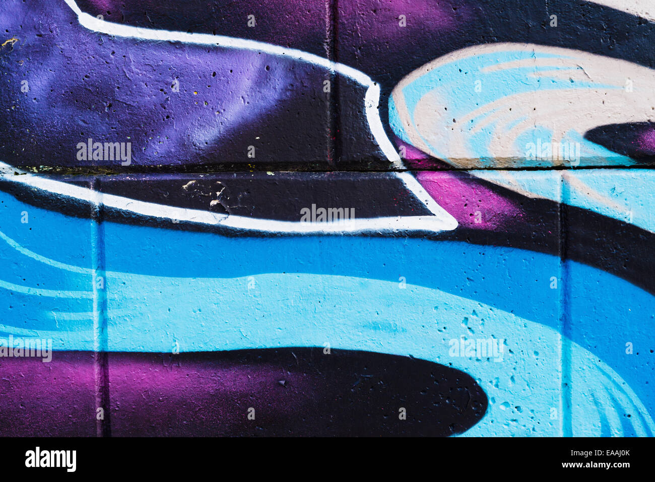 Arte de la calle graffiti, vibrante detalle multicolor de arte de graffiti en la pared. Foto de stock
