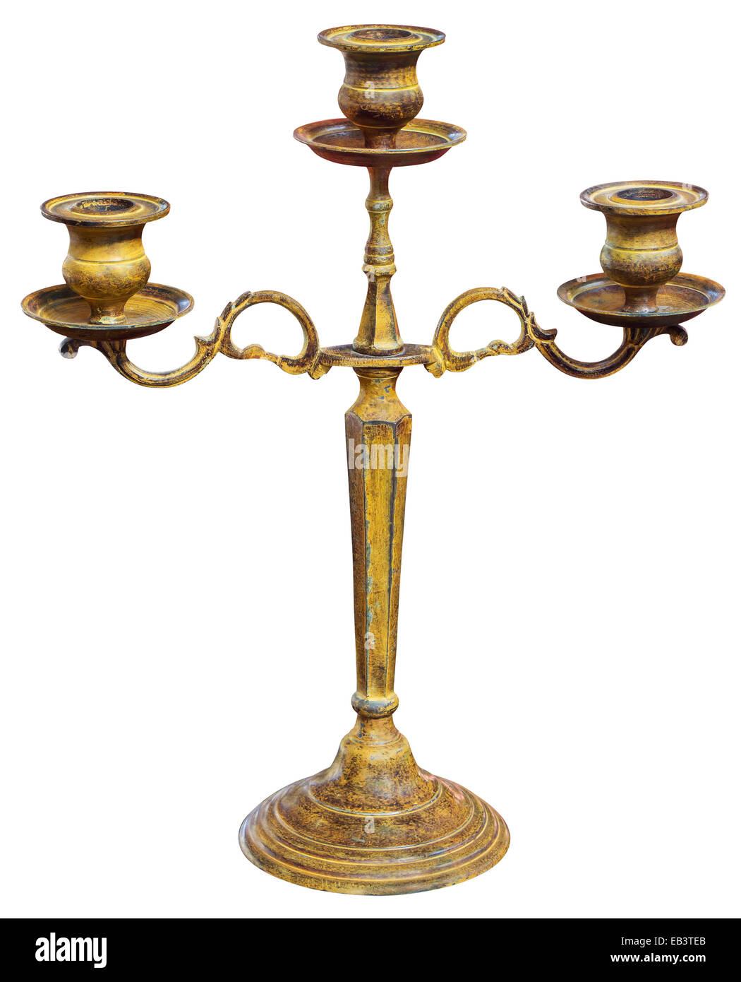 Antiguo candelabro de oro aislado sobre fondo blanco con trazado de recorte Foto de stock