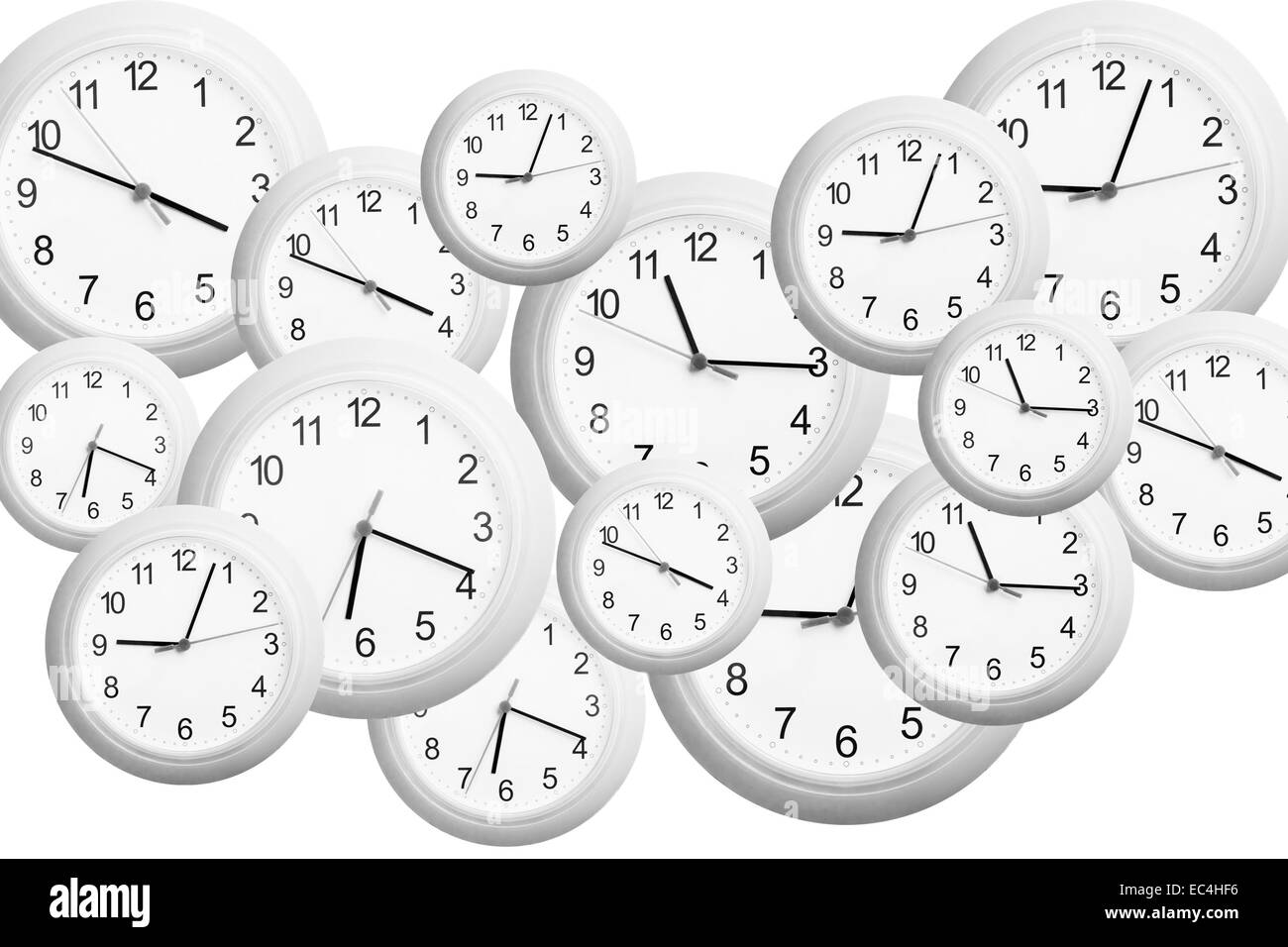 Varios relojes en diferentes tamaños y tiempos en un fondo Foto de stock