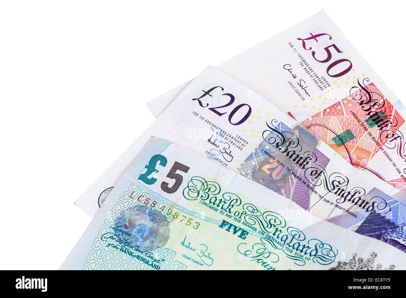 Billetes en libras inglesas aislado sobre fondo blanco con trazado de recorte Foto de stock