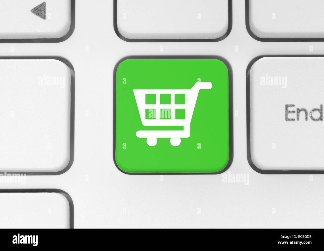Icono del carrito de la compra en verde Botón de teclado Foto de stock