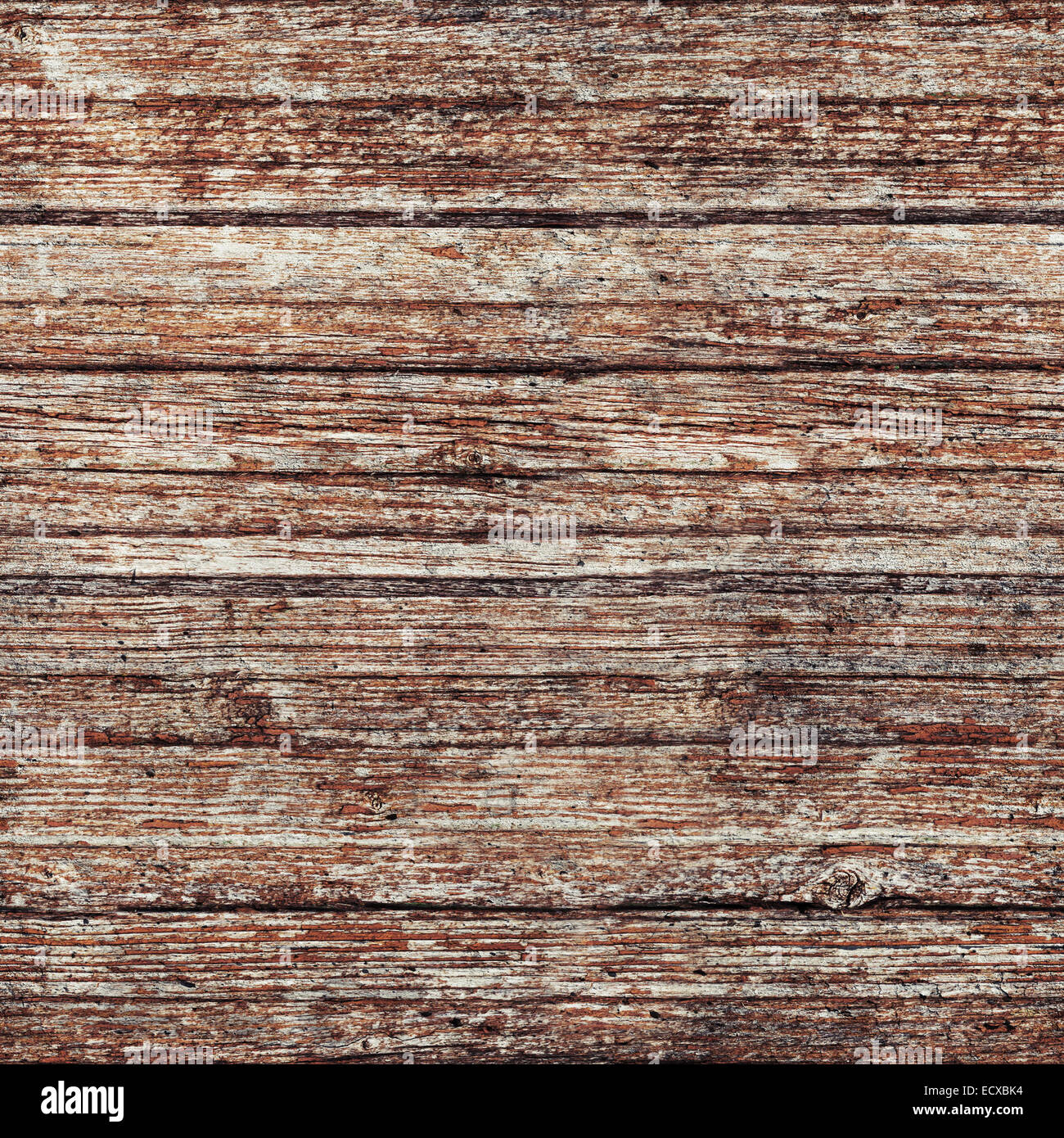 Gris vieja pared de madera con pintura roja dañada, la capa de fondo cuadrada perfecta textura fotográfica Foto de stock