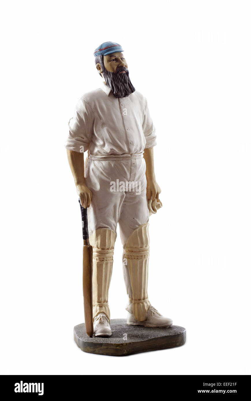 Figura de madera pintada de W.G Gracia sobre fondo blanco aislado Foto de stock