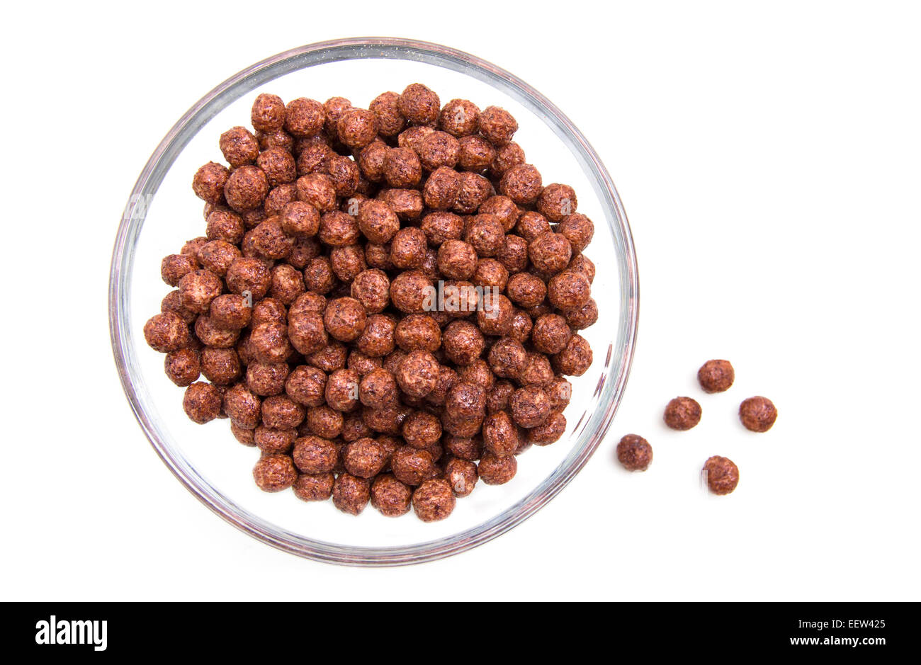 Tazón de cereales con chocolate sobre fondo blanco vista superior Foto de stock