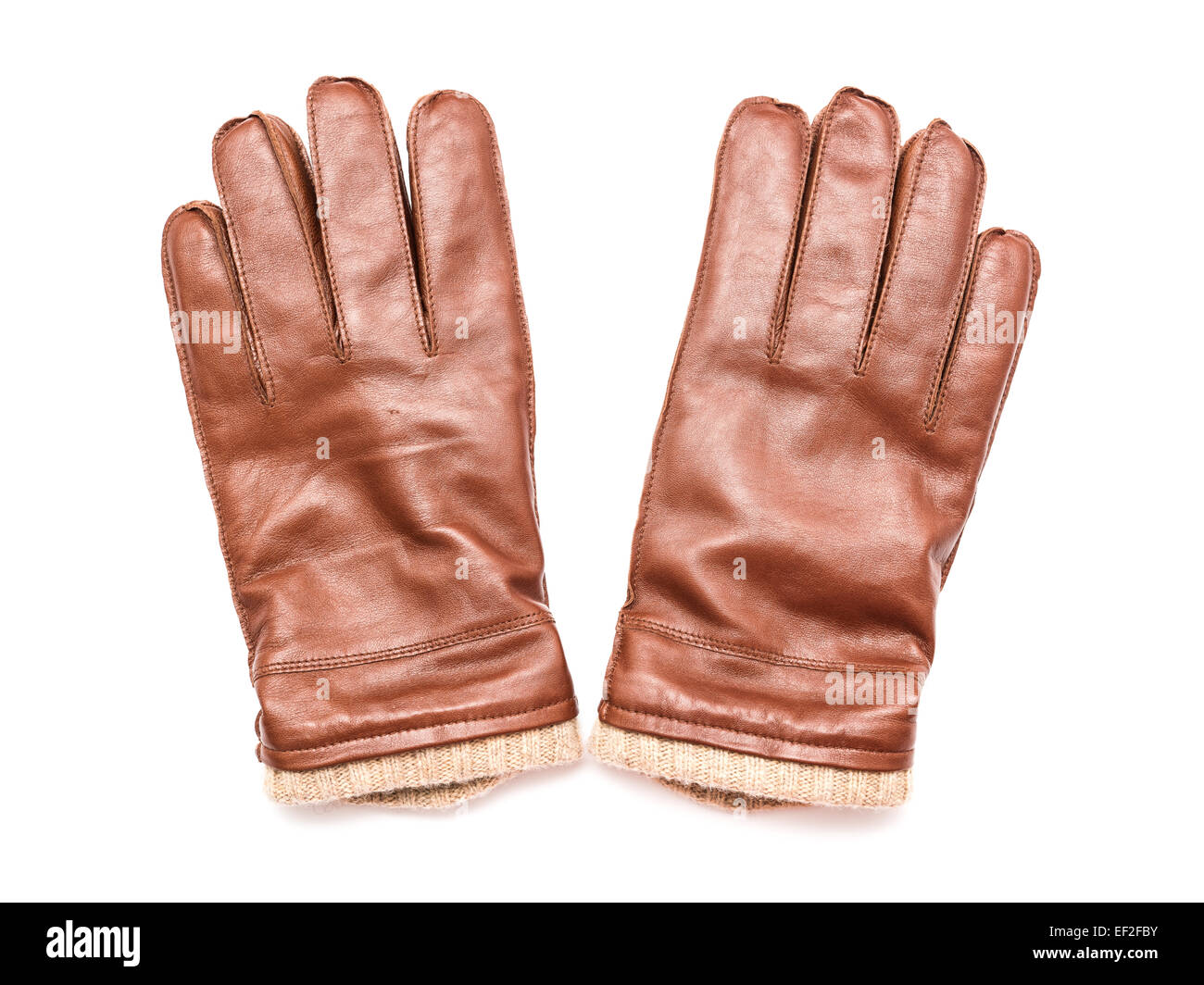 Par De Guantes De Cuero Marrón Aislados Fotos, retratos, imágenes y  fotografía de archivo libres de derecho. Image 72504306