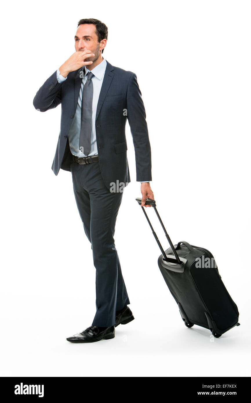 Longitud total retrato de un empresario con maleta de parar un taxi  Fotografía de stock - Alamy