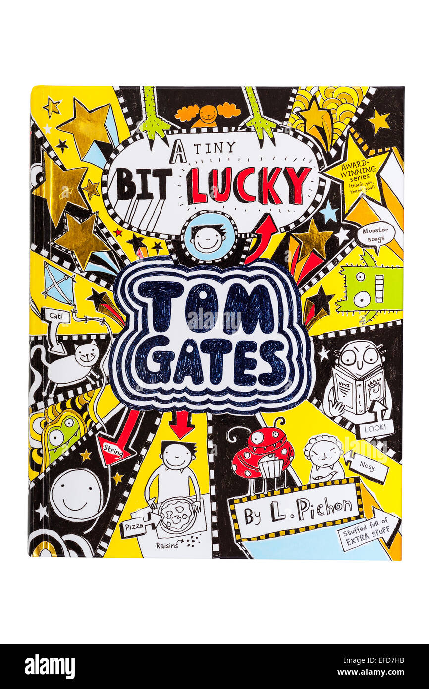 El libro de Tom Gates un poco afortunado sobre un fondo blanco. Foto de stock