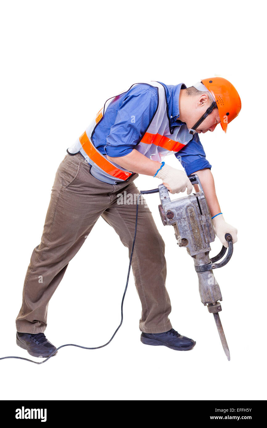 Trabajador con taladro percutor neumático equipos aislados sobre blanco  Fotografía de stock - Alamy