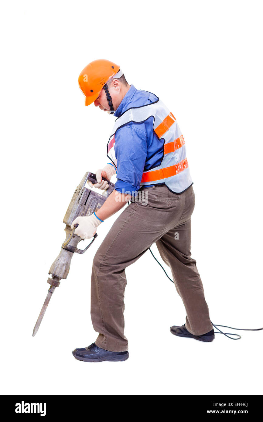 Trabajador con taladro percutor neumático equipos aislados sobre blanco  Fotografía de stock - Alamy