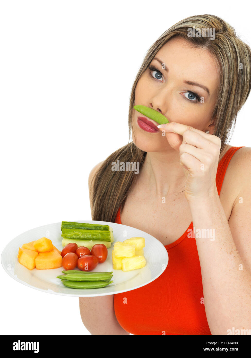 Mujer joven y saludable comer cinco veces al día Foto de stock