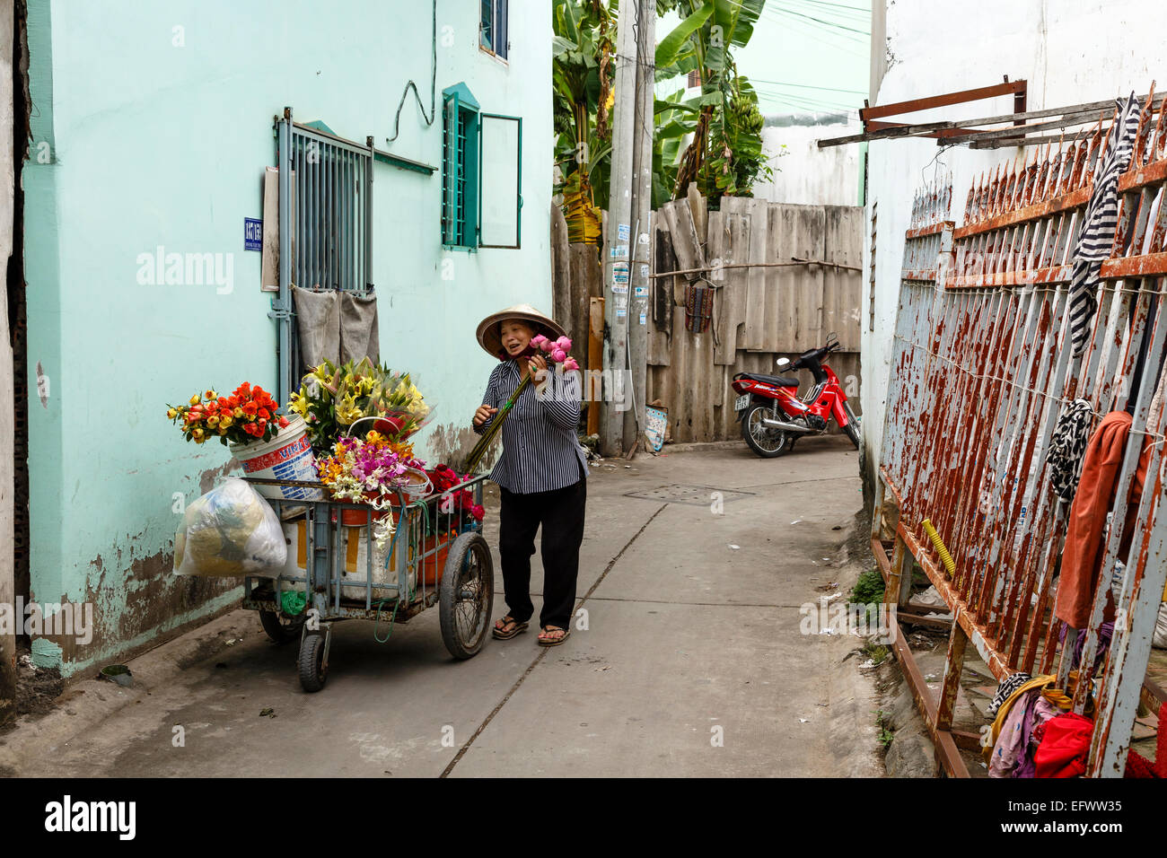 Vendedor de flores, Can Tho, en el Delta del Mekong, Vietnam Foto de stock