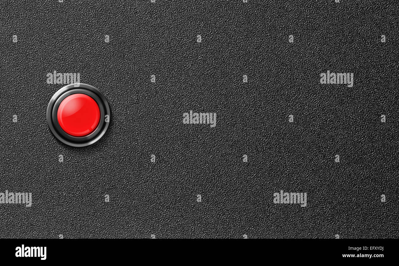 Botón pulsador rojo inicio sobre fondo negro de plástico Foto de stock