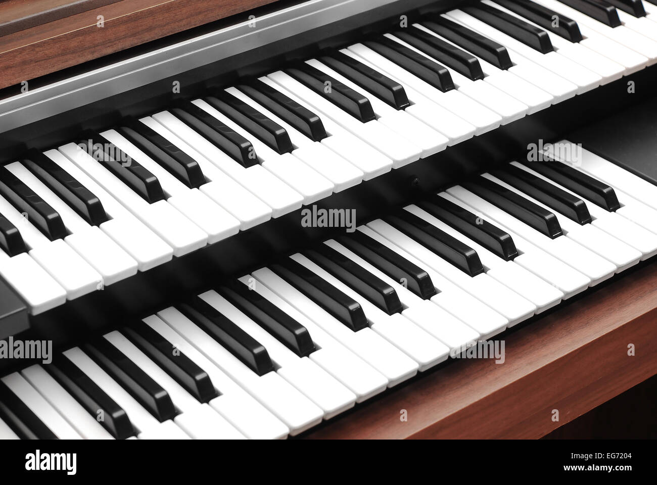 Doble teclado piano closeup Fotografía de stock - Alamy