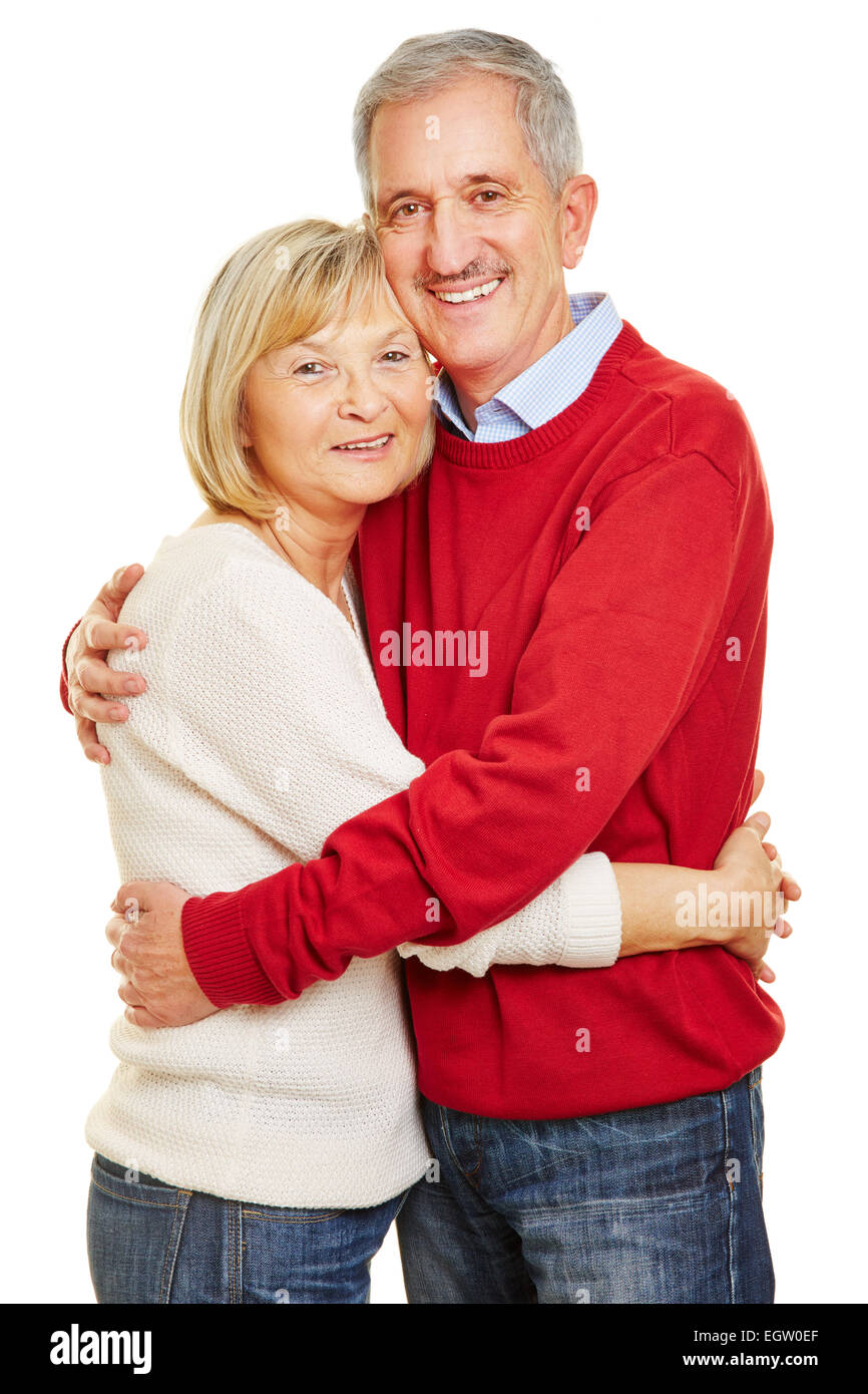 Feliz pareja de dos abrazando a ciudadanos de la tercera edad Foto de stock