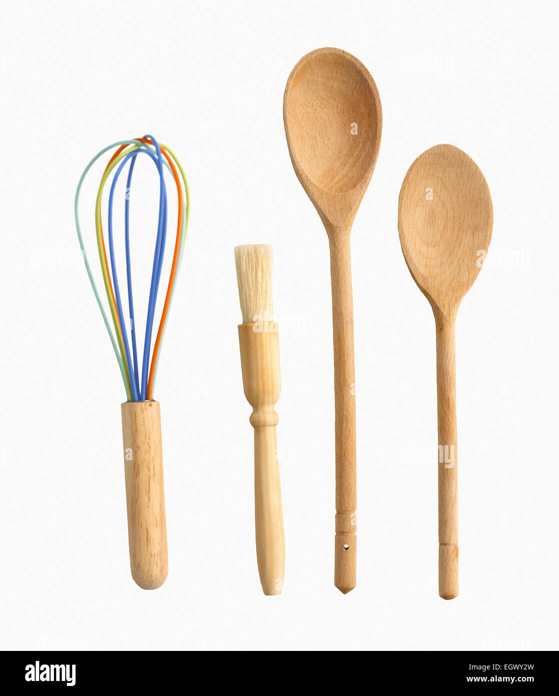 Batir, brocha, cucharas de madera Foto de stock