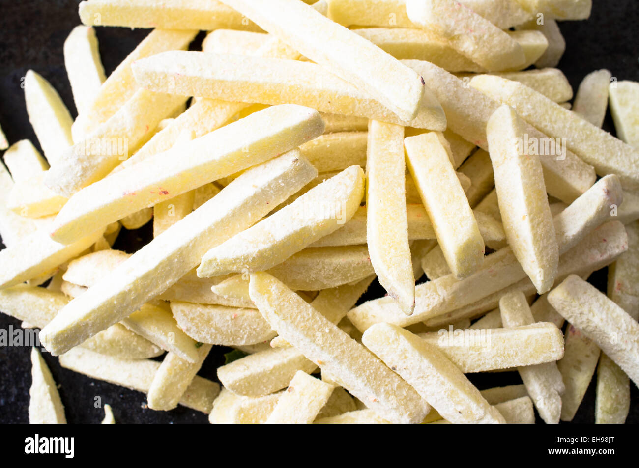 Rodajas de patatas congeladas para cocinar papas fritas Fotografía de stock  - Alamy