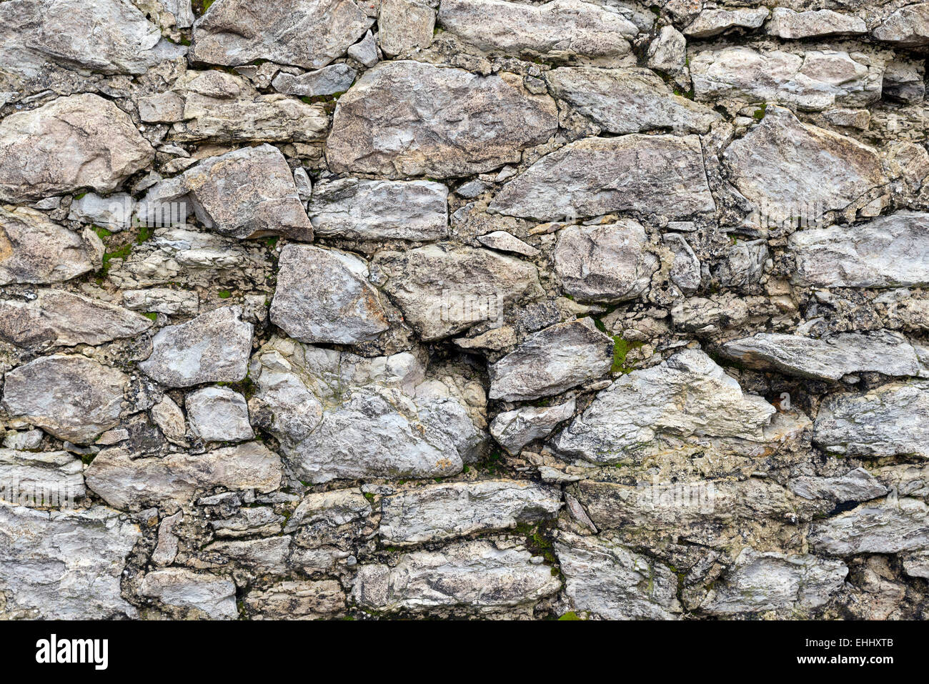 Antecedentes - muro de piedra apilada. Foto de stock