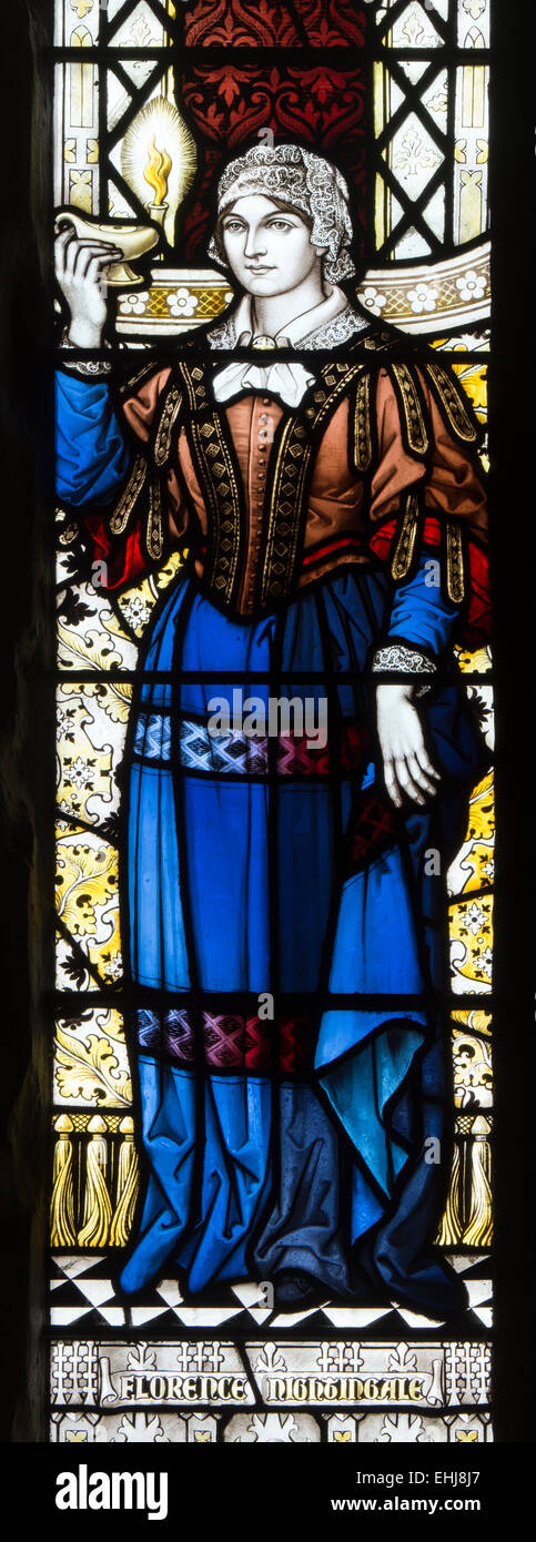 Florence Nightingale, las vidrieras de la Iglesia de San Juan Bautista, Beckford, Worcestershire, Inglaterra, Reino Unido. Foto de stock
