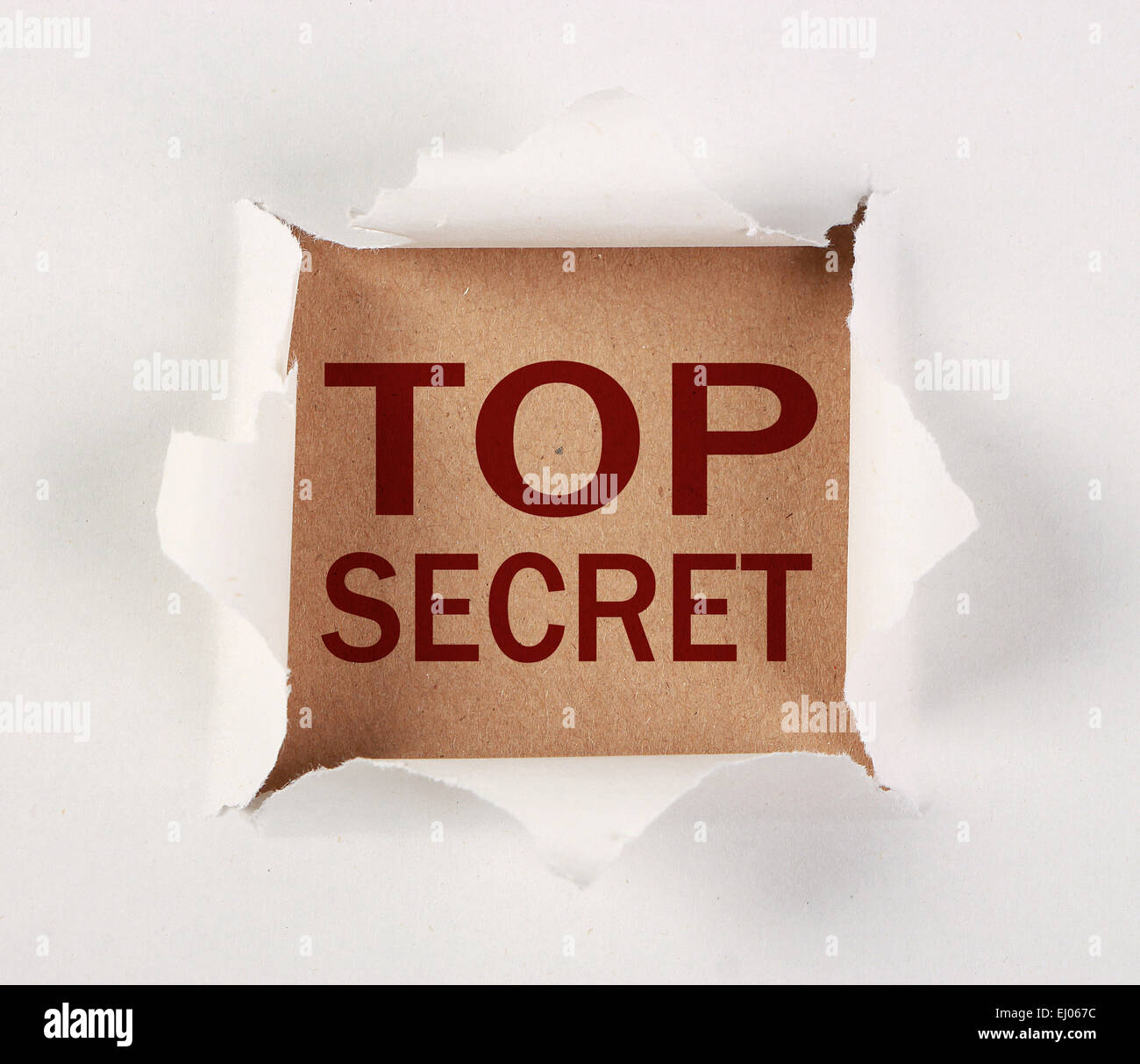 Top Secret con lágrimas en papel marrón. Foto de stock