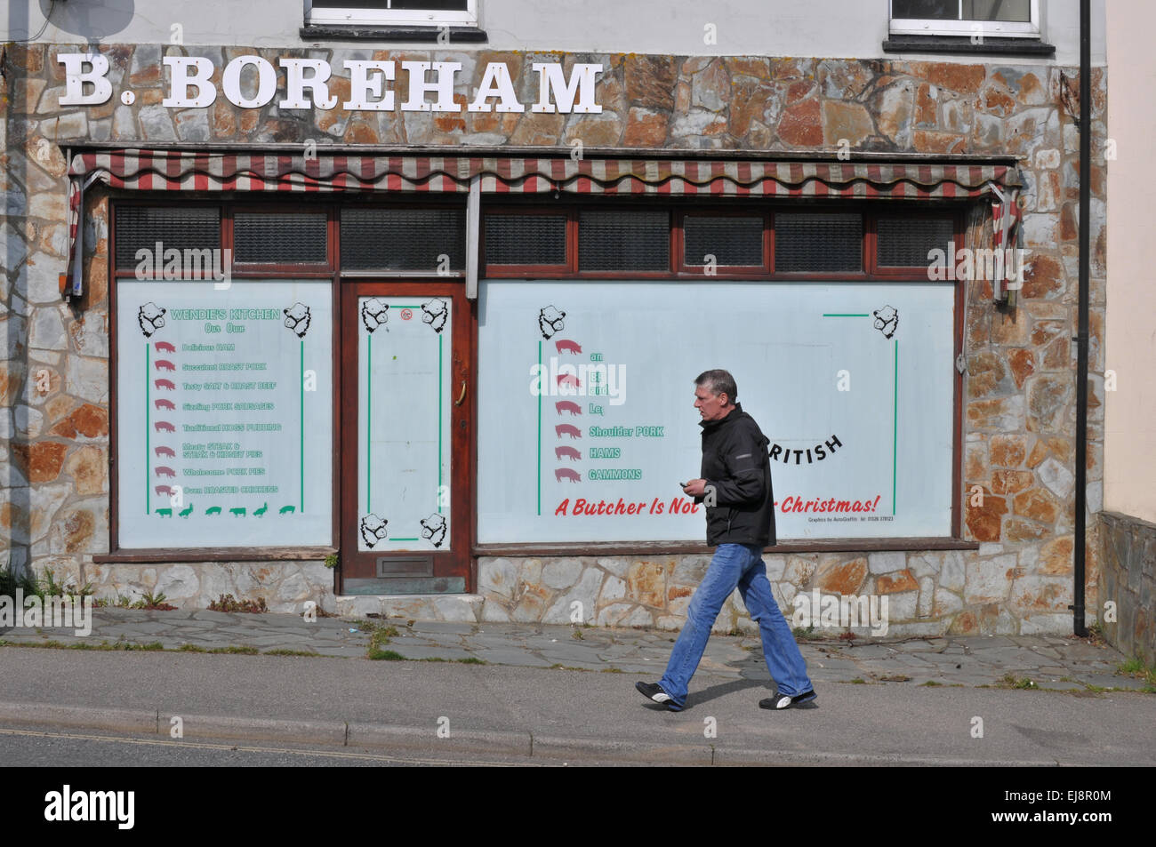 Una tienda de carniceros en Falmouth cerrado. Foto de stock