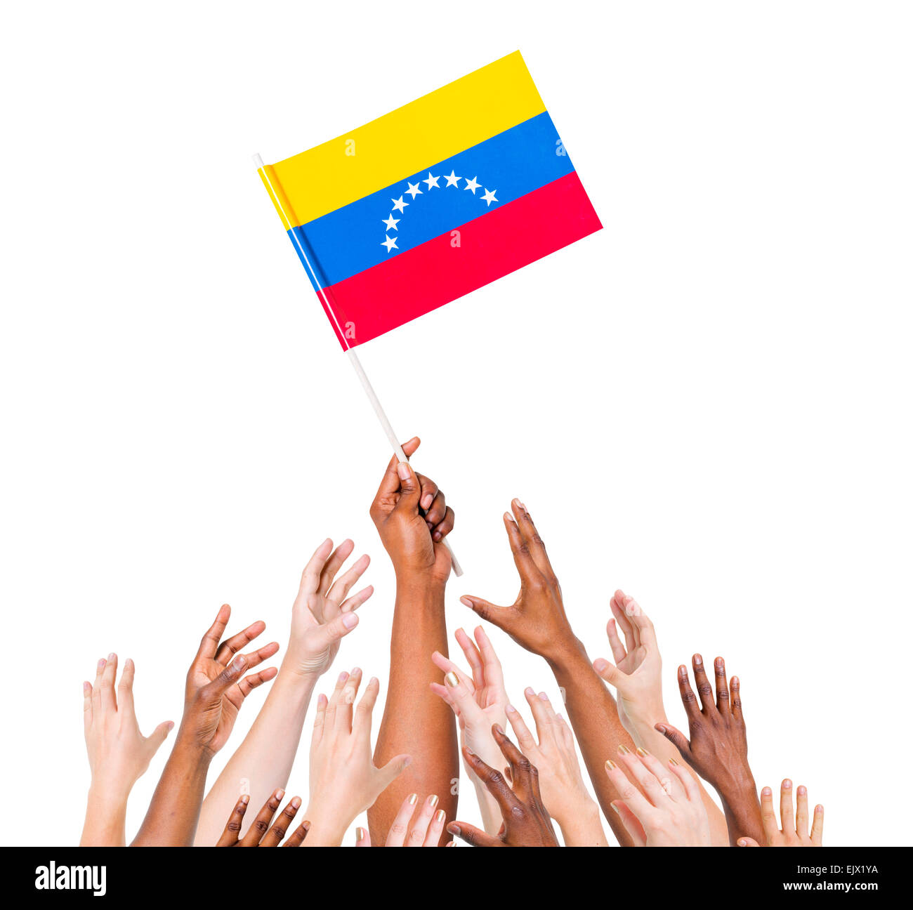 Brazos multiétnicos planteadas para el pabellón de Venezuela Foto de stock