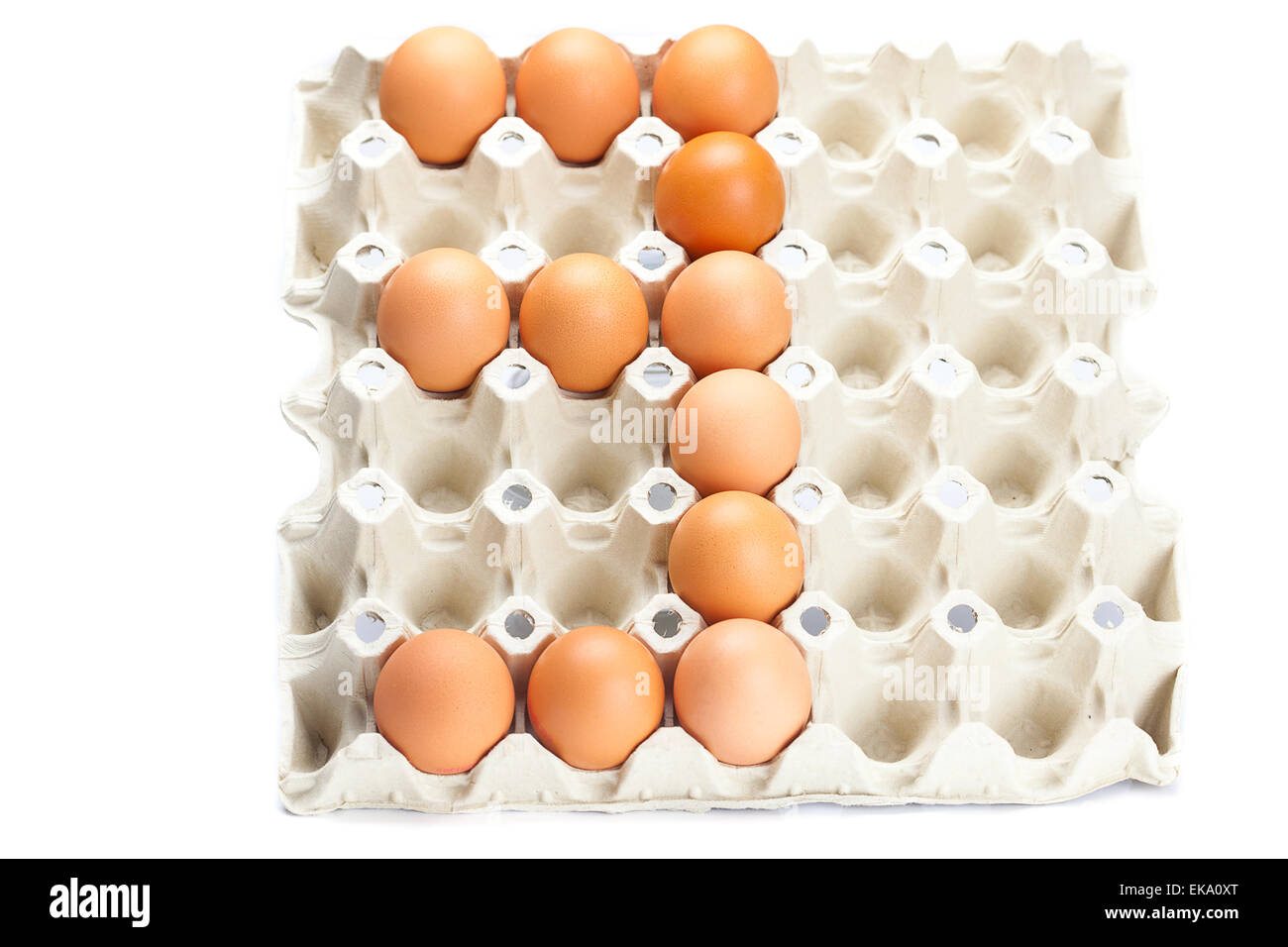 El número de huevos como tres aislados sobre blanco Foto de stock
