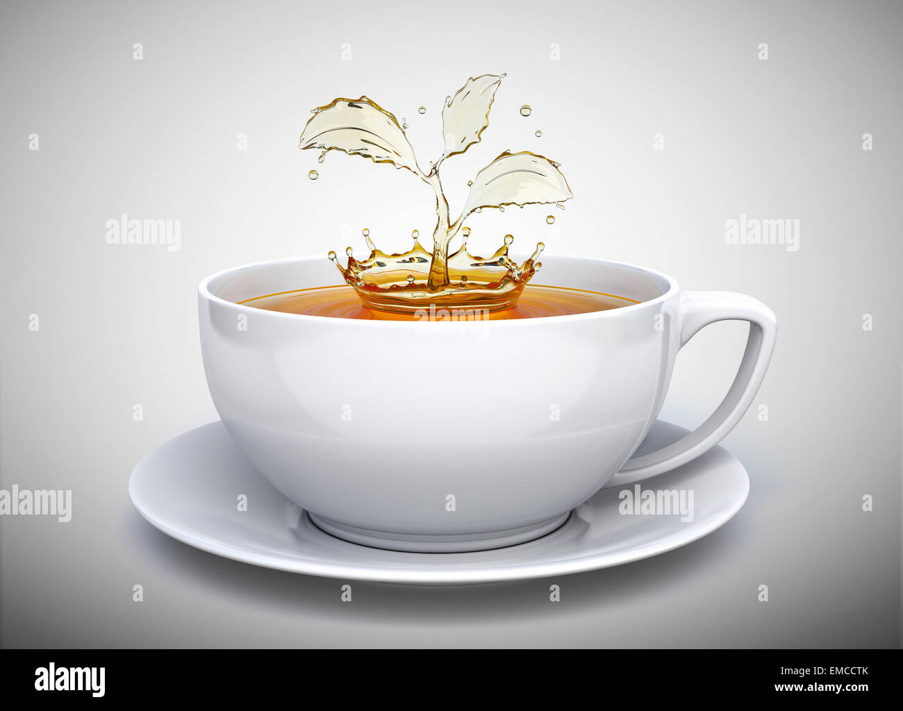 Splash de té en forma de una planta en blanco cup Foto de stock