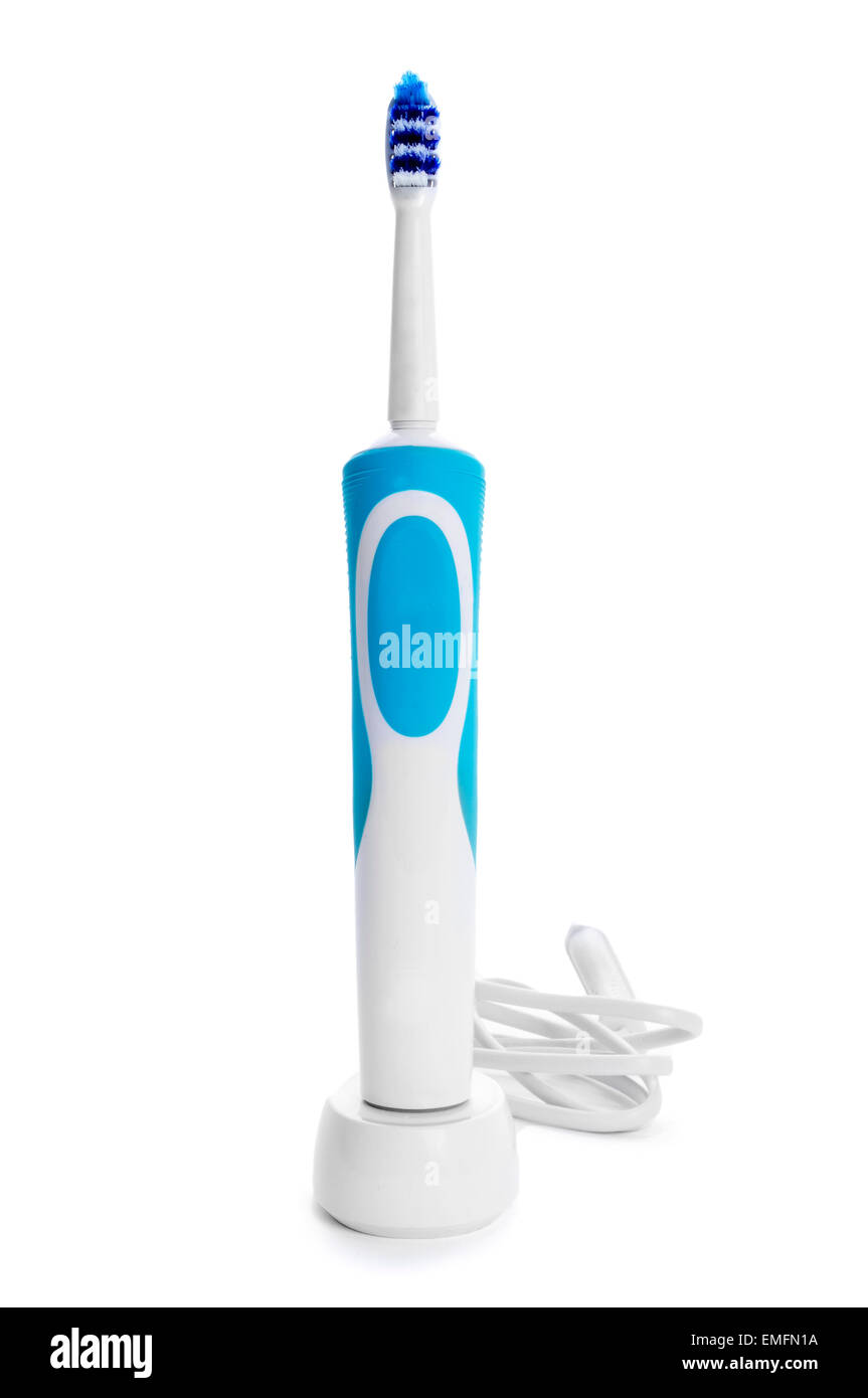Un nuevo cepillo de dientes eléctrico sobre un fondo blanco. Foto de stock
