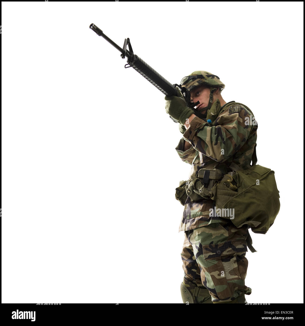Soldado del ejército estadounidense apuntando pistola Foto de stock