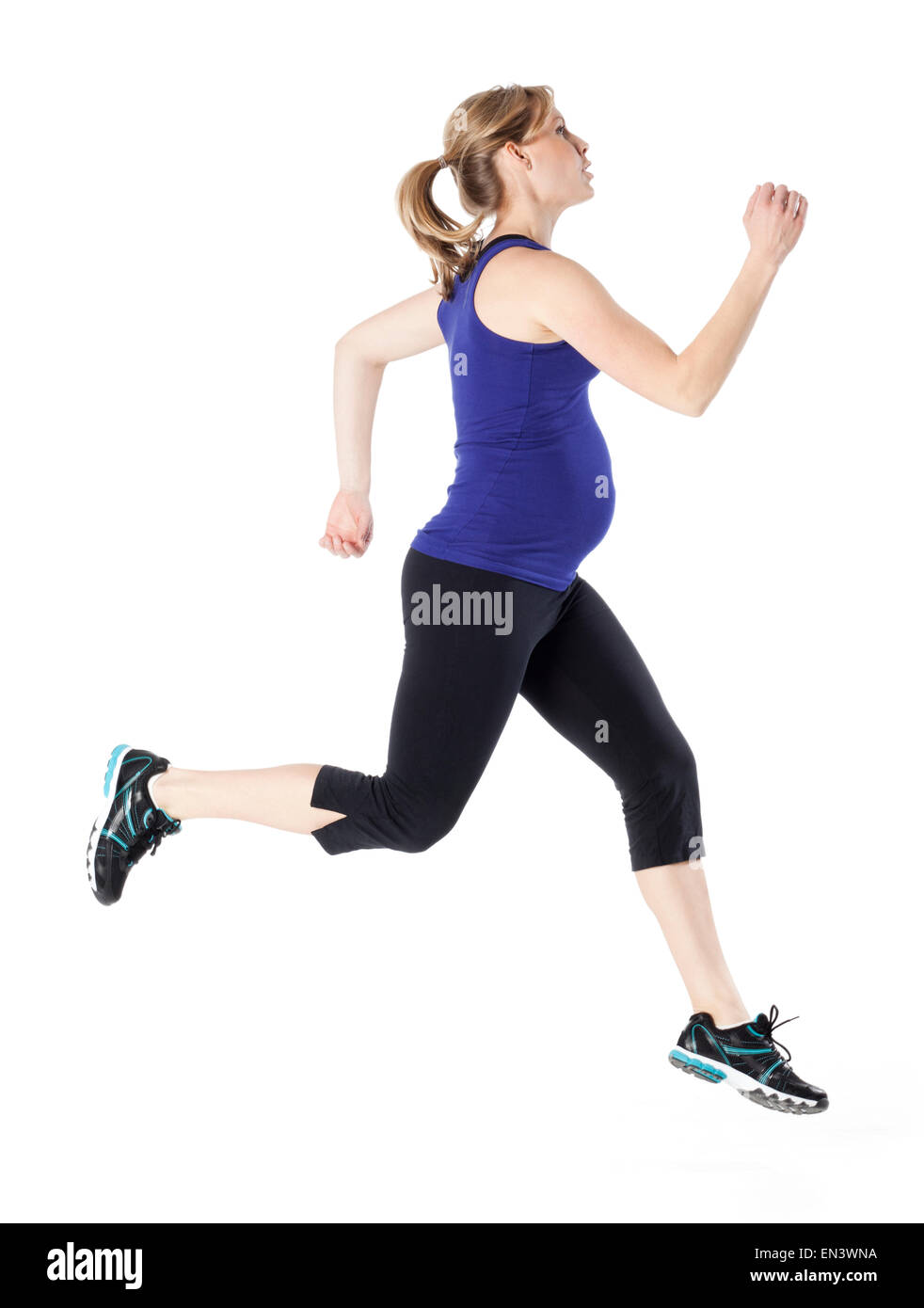 Joven Embarazada en ropa deportiva en marcha, Foto de estudio Fotografía de  stock - Alamy