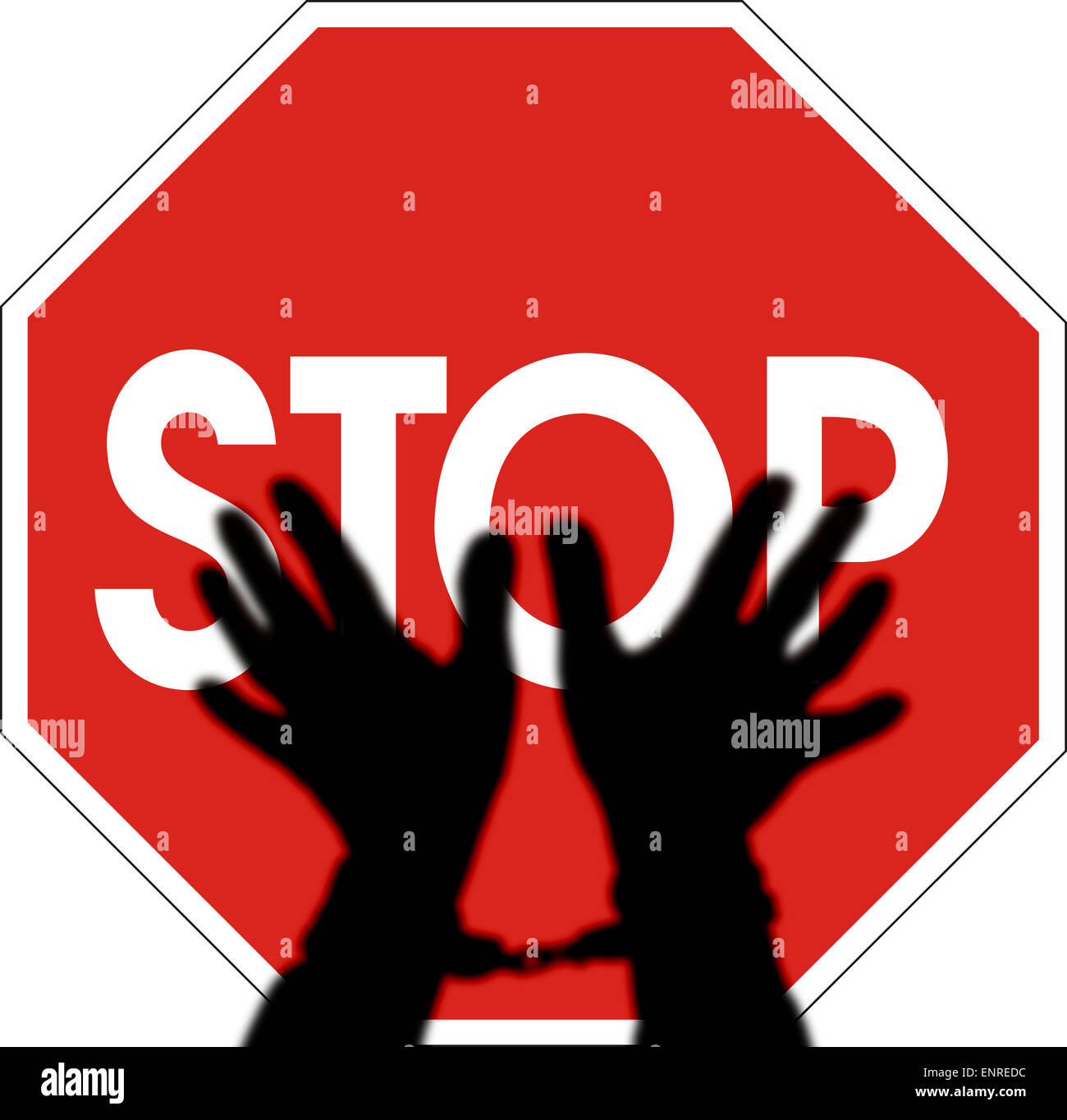 Siluetas de manos esposadas en la señal de stop, advertencia Foto de stock
