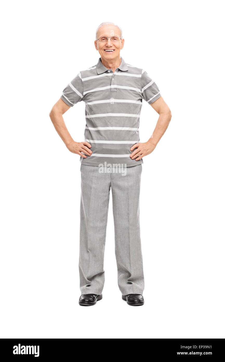 Retrato de una longitud total superior casual en gris, pantalones y camisa de polo, sonriendo y mirando la cámara Foto de stock
