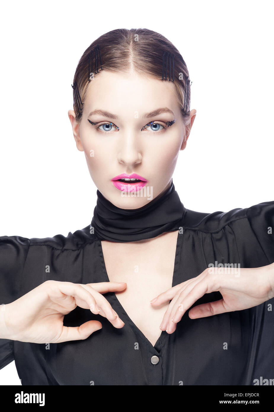 Hermosa mujer joven con maquillaje moda aislado Foto de stock