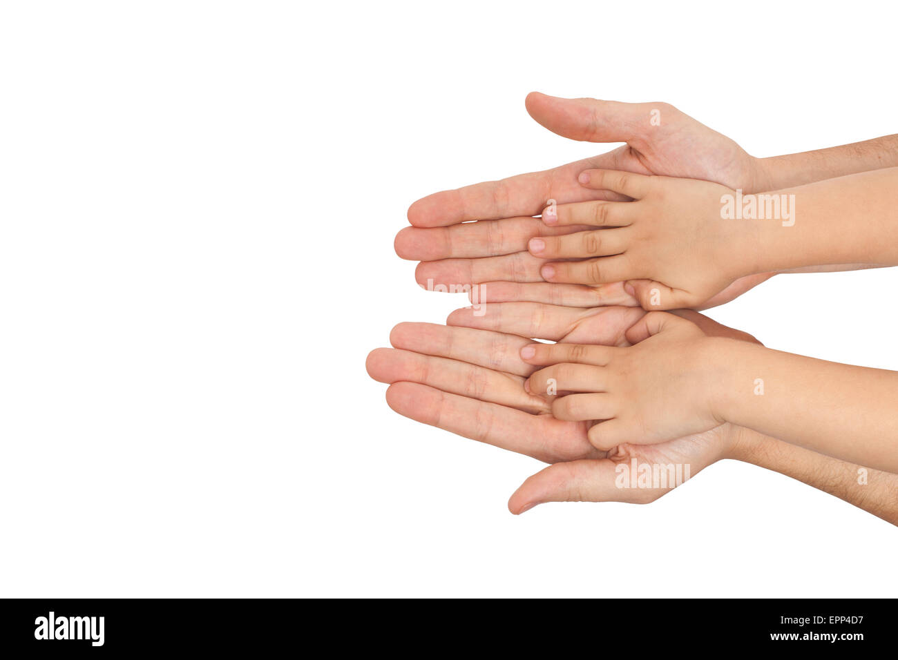 Padre e hijo manos aisladas sobre fondo blanco. Foto de stock