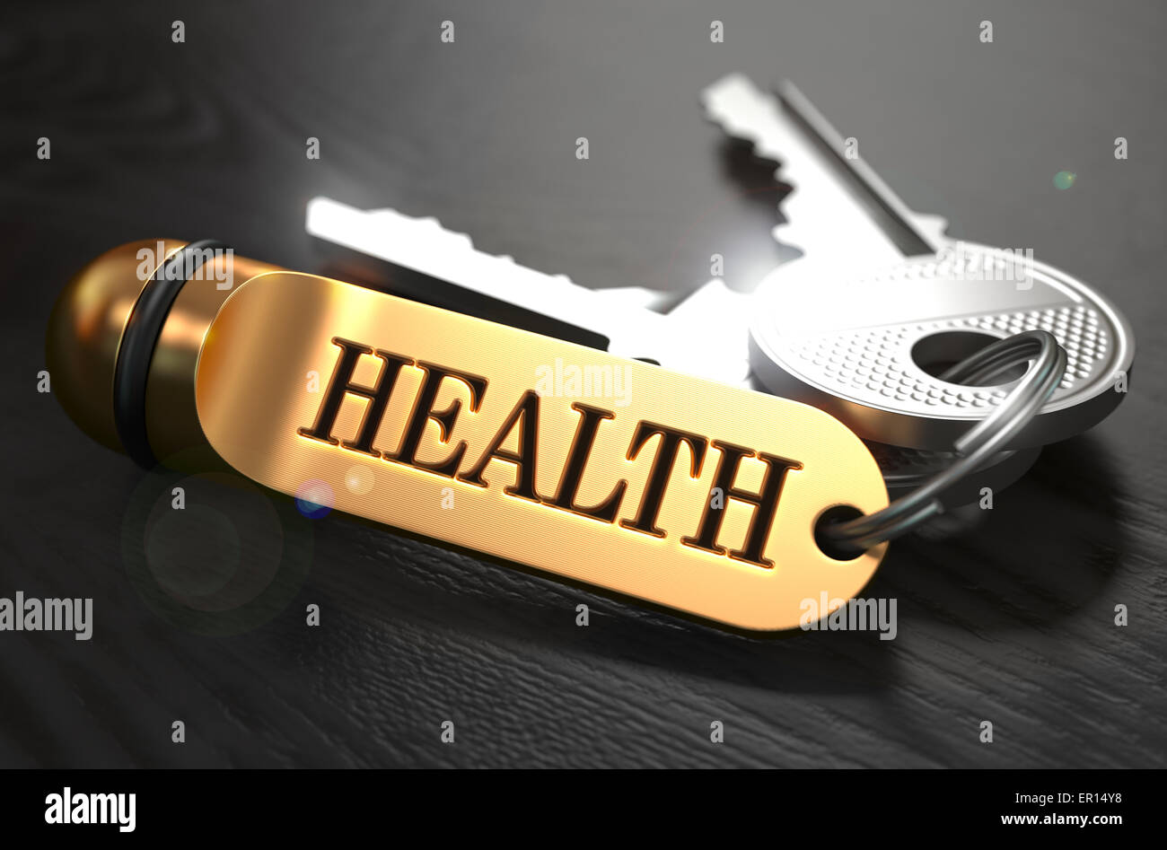Claves para la salud. Concepto en Golden keychain. Foto de stock