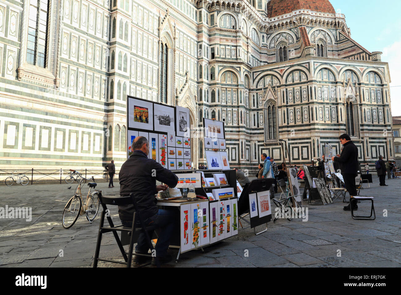 Los artistas callejeros en la Catedral de Santa Maria del Fiore, Florencia. Foto de stock