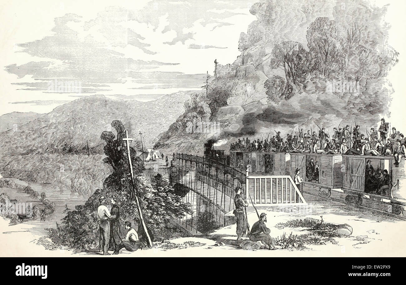 El 16º Regimiento, Ohio voluntarios bajo el Coronel Irwine, cruzando la bandeja ejecutar viaducto, cerca del río, en el tramposo de Baltimore y Ohio Railroad, guerra civil EE.UU. Foto de stock