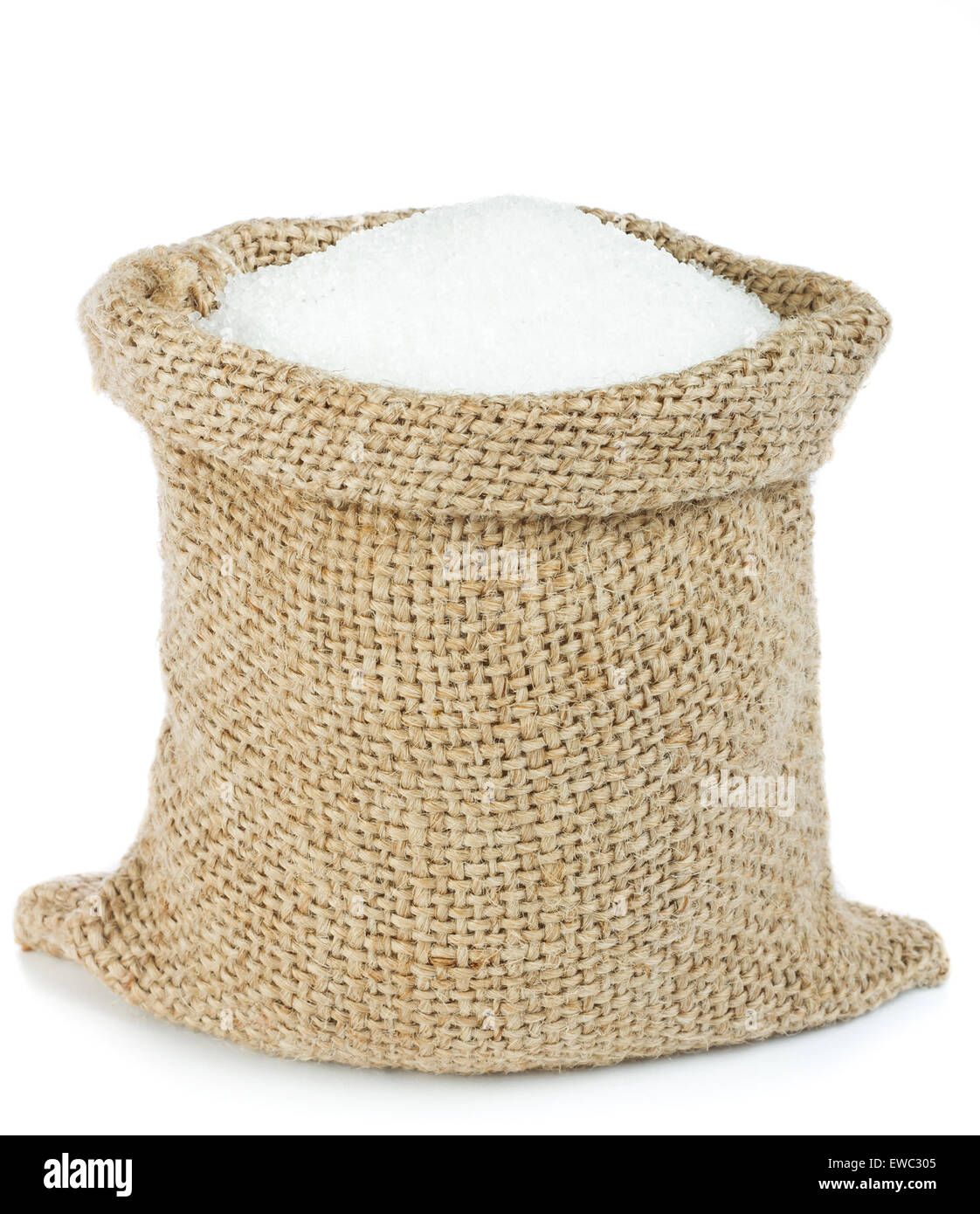 El azúcar blanco en bolsa de arpillera Foto de stock